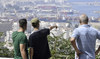 A youth point towards the ports in Algiers, Algeria, Monday, July 29, 2024. (AP)