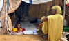 A displaced Sudanese woman rests inside a shelter at Zamzam camp, in North Darfur, Sudan, August 1, 2024. (REUTERS)