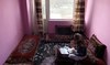 Barred from school, Afghan girls find temporary relief in online classes