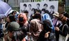 Fans wait to visit a pop-up store of South Korean K-pop sensation BTS entitled “Monochrome” in Seoul on April 26, 2024. (AFP)