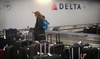 Dead woman found entangled in baggage machinery at Chicago airport