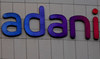 The logo of the Adani Group is seen on the facade of its Corporate House on the outskirts of Ahmedabad, India, January 27, 2023.