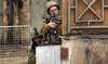 Israeli soldiers take aim during clashes in the centre of Hebron in the occupied West Bank on July 4, 2023. (AFP file photo)