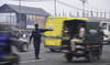 A Congolese policeman directs traffic in Kinshasa, on July 2, 2024. (AFP)