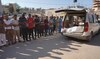 Palestinians attend the funeral of members of the Najjar family, killed in an Israeli strike, in Khan Yunis in southern Gaza.