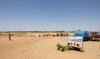 People cross the border between Sudan and Chad at the border post in Adre. (File/AFP)