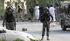 Pakistani security personnel stand guard in the Hayatabad area of Peshawar, Pakistan. (File/AFP)