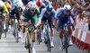 Groves wins Vuelta stage 14 as Roglic survives puncture scare