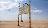 A sign that reads “Arabian Gulf Oil Company, Nafoora Oilfield” stands in Jakharrah, Libya, August 27, 2024. (Reuters)