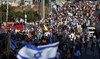 People attend a demonstration calling for the immediate return of hostages held in Gaza.