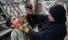 Gunmen kill a polio worker during a vaccination campaign in Pakistan