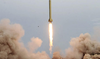 An Iranian Shahab-3 missile rises into the air after being test-fired at an undisclosed location in the Iranian desert. (AFP)