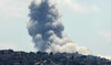 Smoke billows from the site of an Israeli airstrike that targeted the southern Lebanese village of Houla on September 16, 2024. 