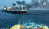 Burning oil tanker safely towed away from Yemen after rebel attacks, EU says