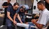 A man with an above-the-knee amputation is fitted with a new prosthetic limb at a Jordanian field hospital in Khan Yunis.