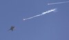 Israeli jets are carrying out huge sonic booms over Beirut, witness