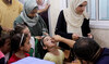 A Palestinian child is vaccinated against polio in Jabalia in northern Gaza Strip, September 10, 2024. (Reuters)