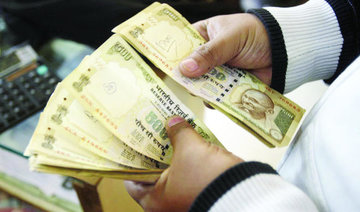 Indian rupee falls on devaluation report