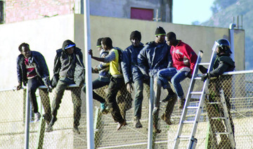 100 migrants scale fence to enter Spain’s Melilla