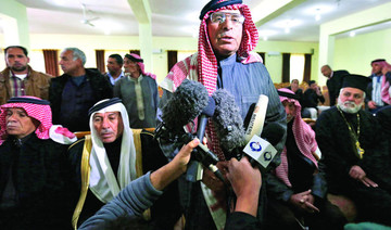 Father of captured Jordanian pilot asks IS to treat son well