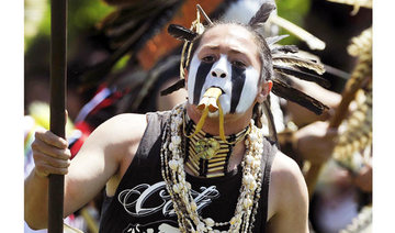 Native American student sues over right to wear feather