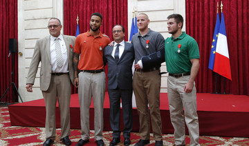 France honors bravehearts who thwarted train attack