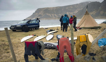 Polar tourists see an icy world melt