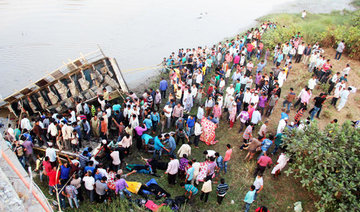 37 dead in India after bus plunges into river