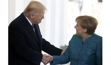 Tensions show as Trump, Merkel meet for first time