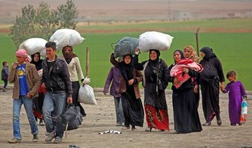 Syrians flee Raqqa ‘hell’ as US-backed assault nears