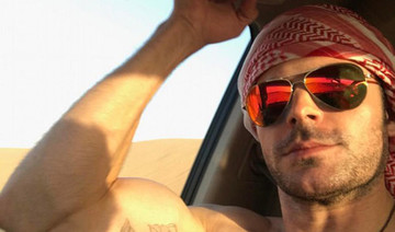 Donning a ghutra, Zac Efron takes to the desert in Emirati style