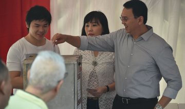 Jakarta votes amid religious tension