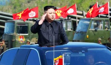 North Korea says new long-range missile can carry heavy nuke