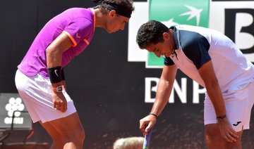 Nadal advances as Almagro quits with knee problem