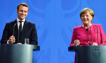 Merkel says Germany must help France’s Macron to succeed