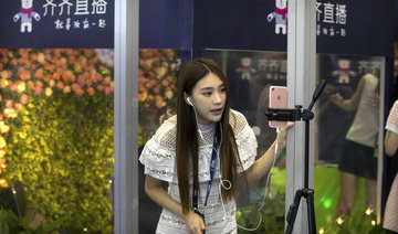 China shuts some live streaming sites, punishes companies