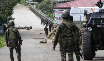 Philippines warns Islamist militants to surrender or die