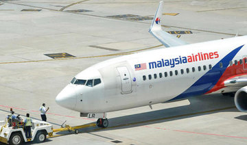 Passengers subdue man trying to enter cockpit of Malaysia Airlines