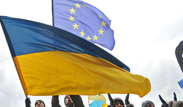 Ukrainians cheer on first day of visa-free EU travel