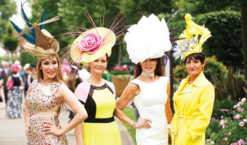 Despite high temps, Royal Ascot-goers don finest outfits