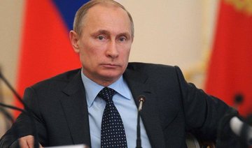 Putin attacks sanctions, protectionism on eve of G20