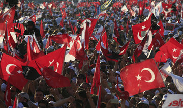 Turkey celebrates defeat of anti-Erdogan putsch after new purge