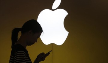 Apple shares sail to record high on healthy iPhone smartphone sales