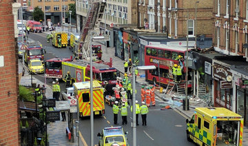 London double-decker bus crashes into store, several hurt