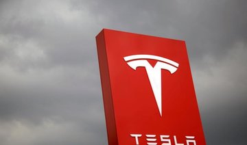 Tesla raises $1.8 billion in first junk bond offering