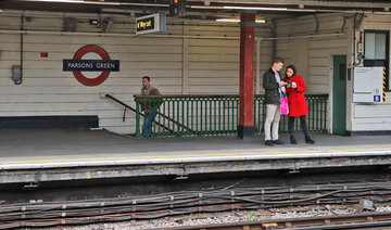 Second man arrested as threat level lowered after London Tube attack