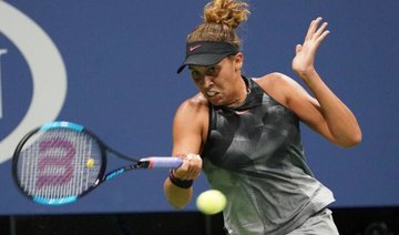 Injury-hampered Keys out in Wuhan first round