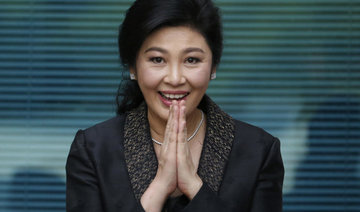 Ousted Thai PM Yingluck sentenced in absentia to 5 years for negligence