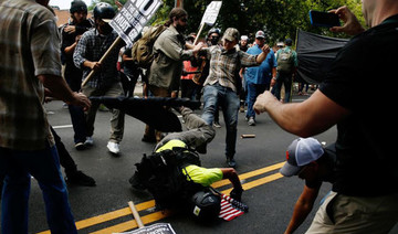 White nationalists return to Charlottesville for torch-lit protest