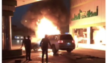 Saudi man pushes burning car away from gas station